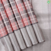 peach shades with cream checked lines design iron grey border trendy designer silk saree