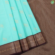 Spring green gold zari butta design contrast brown rangoli border gift saree