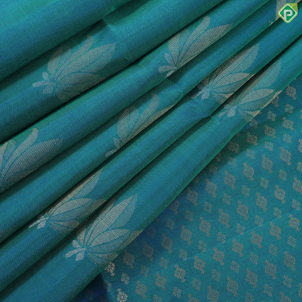 Peacock blue fancy lotus butta design self gold zari border grand pallu soft silk saree