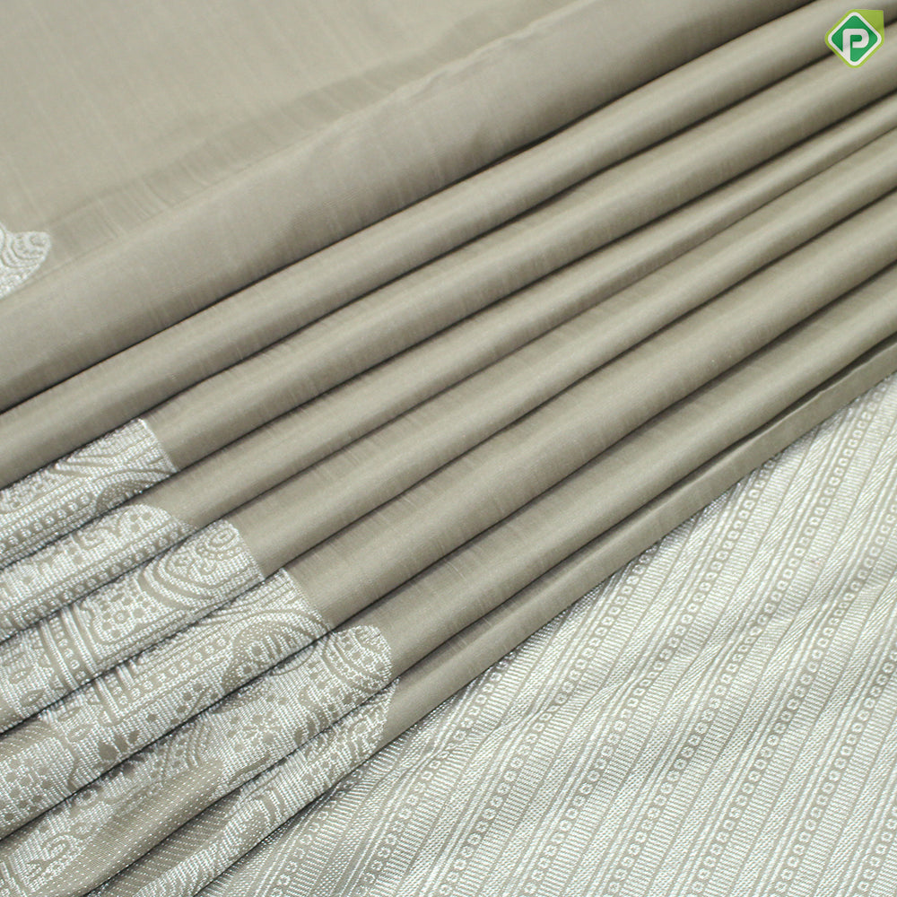 Beige Plain Body Silver Zari Elephant Border Trendy Designer Silk Saree