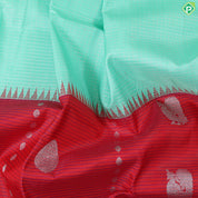 Light green with silver zari (kattam) checkered contrast red with pink lines high border trendy designer silk saree