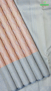 Peach silver and silver gold zari leaf design iron grey border trendy designer silk saree