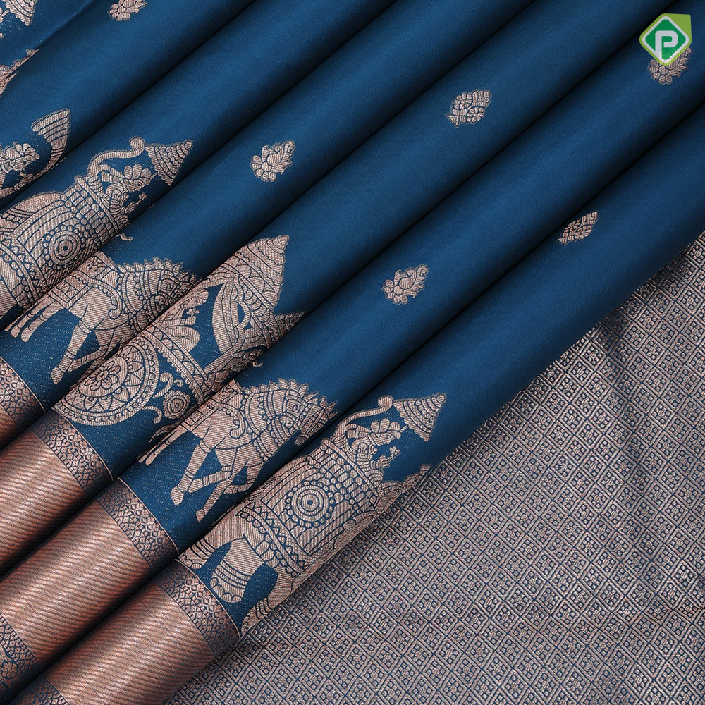 Teal blue copper zari small fancy butta design self copper zari cross lines yaanai ambari border silk saree