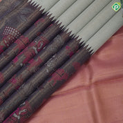 Tea green gold zari plain tissue weaved grape grey base village effect pythonic design long border signature edition silk saree