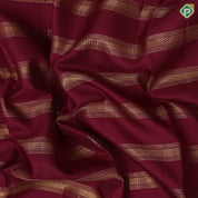 Maroon gold zari self designed velthari lines borderless contemporary fusion silk saree