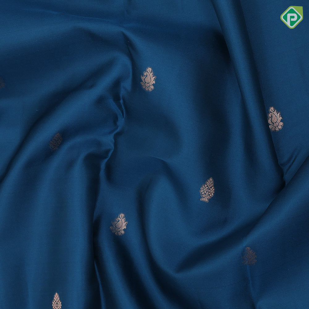 Teal blue copper zari small fancy butta design self copper zari cross lines yaanai ambari border silk saree