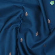Teal blue copper zari small fancy butta design self copper zari cross lines yaanai ambari border silk saree