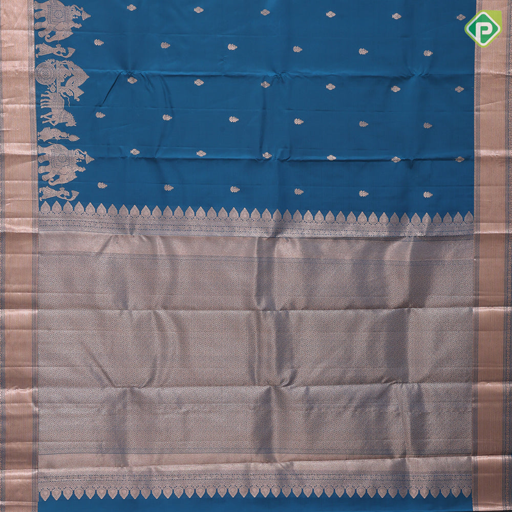 Teal blue copper zari small fancy butta design self copper zari cross lines yaanai ambari border silk saree