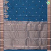 Teal blue copper zari small fancy butta design self copper zari cross lines yaanai ambari border silk saree