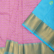 Light pink gold zari buttas into thick checks design sea blue gold zari zig zag border pattu lehanka paavadai