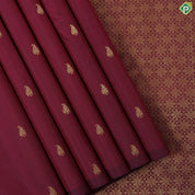 Maroon gold zari mango butta with beige with self stripes half and half trendy silk saree