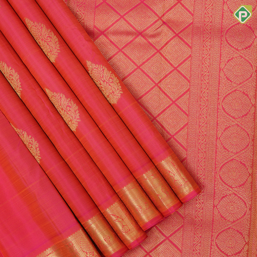 Bottle green gold zari fancy thilagam butta design self color gold zari peacock elephant butts edge border traditional silk saree