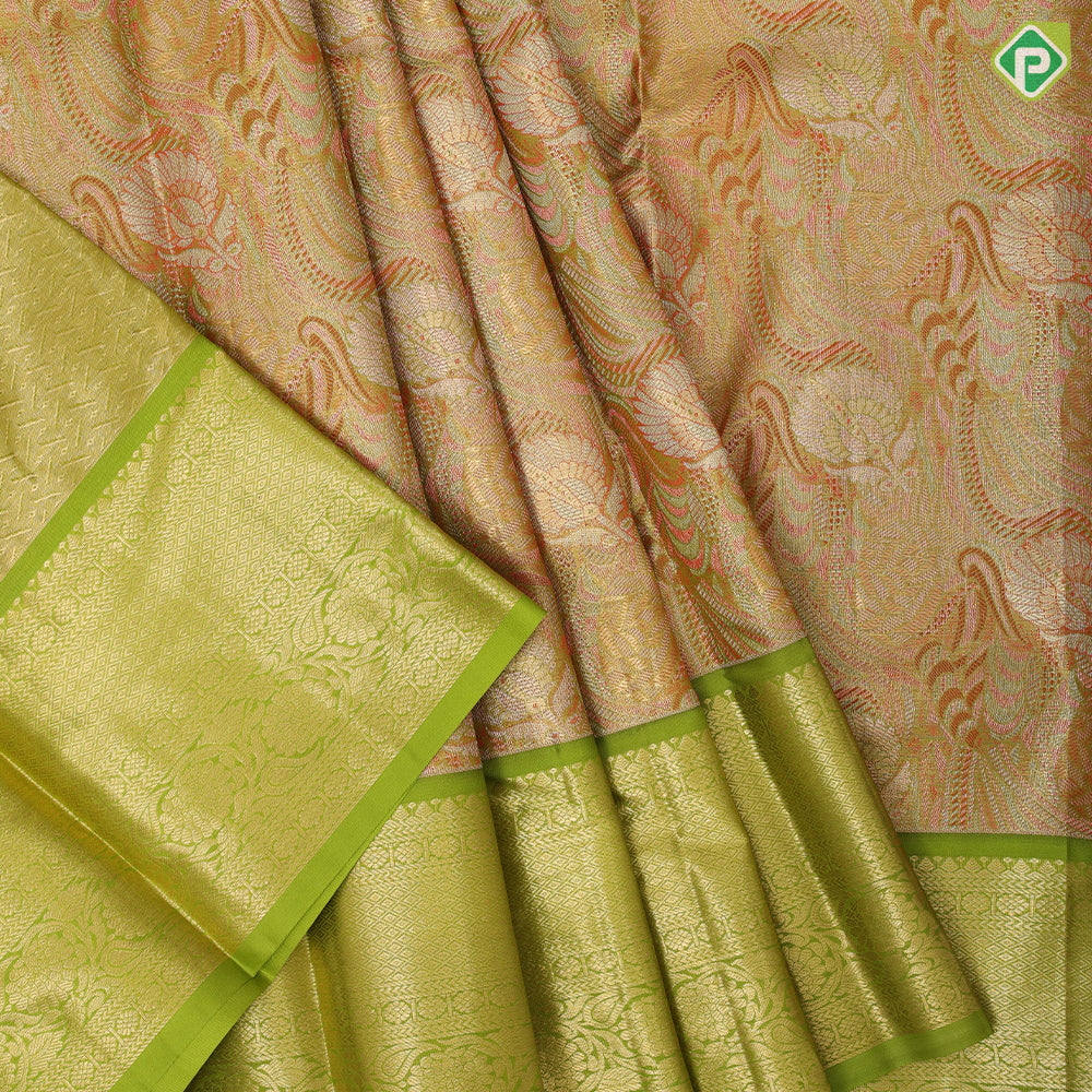 Orange and green base silver gold zari fancy design leaf green gold zari rangoli border pattu paavadai lehanka