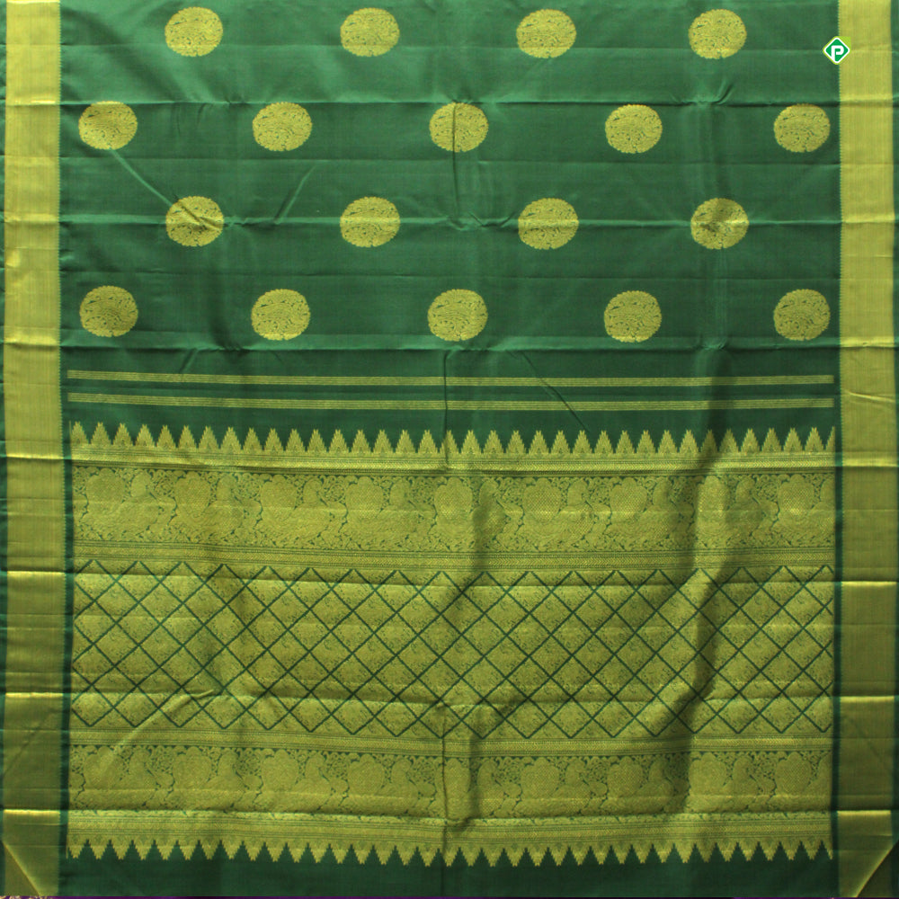 Forest Green Colour Big Chakra Inside Peacock And Floral Motifs Traditional Silks Saree