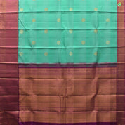 Sea Green With Peacock Motifs Pink Embossed Mango And Button Zari Border Pure Linen Silk Saree
