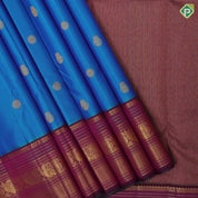 Peacock Blue Gold Zari Gandaberunda Chagaram Butta Design Magenta Peacock Mayilkan Border Design Traditional Silk Saree