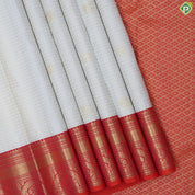 White gold zari checked window panel peacock chakkaram design pinkish orange gold zari border traditional silk saree