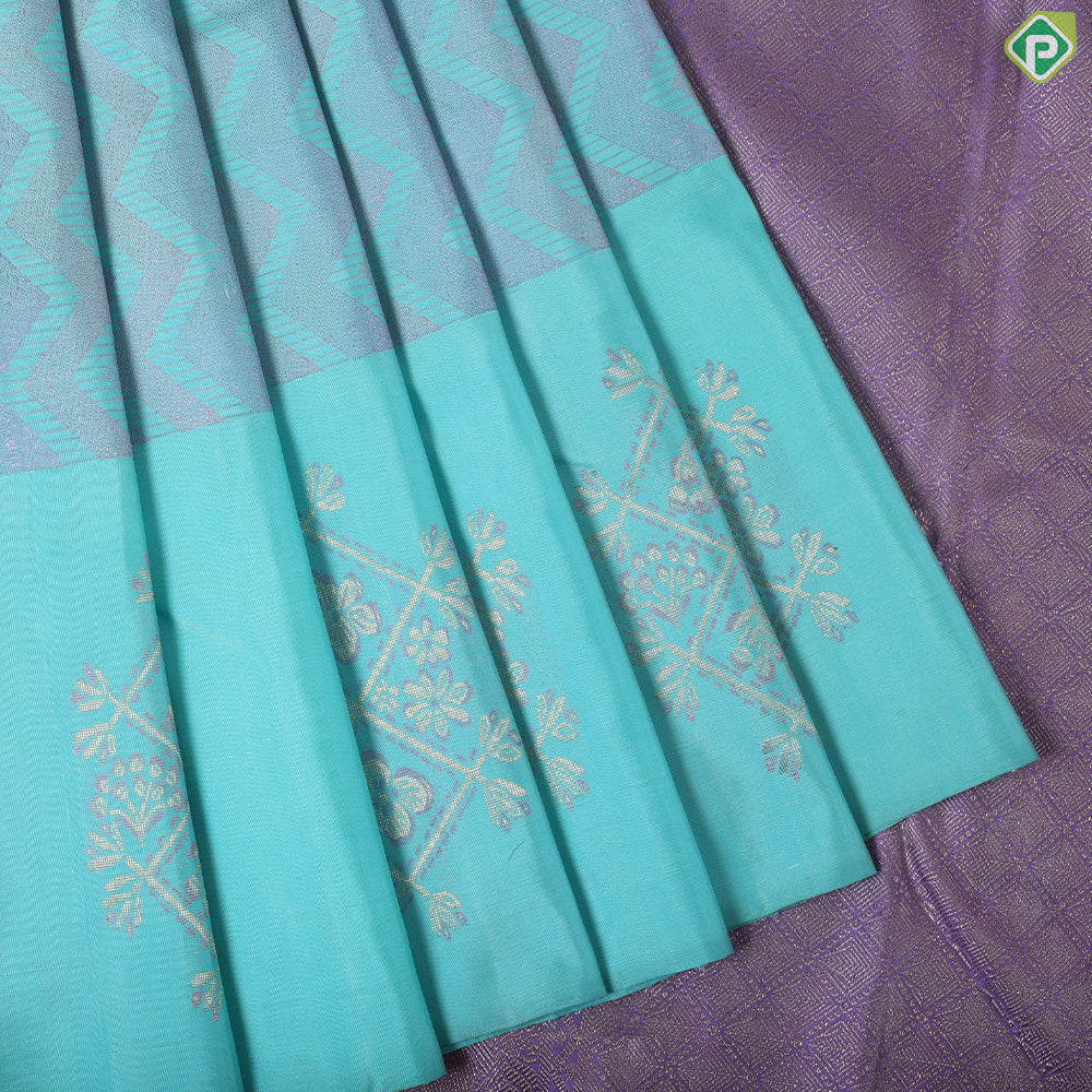 Sea blue lavender zig zag embossed design self meena work big butta border trendy silk saree