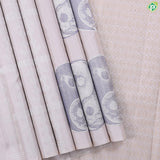 Pinkish cream silver zari ying yang concept inspired borderless signature edition silk saree
