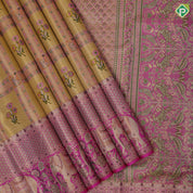 golden yellow with light pink flower bunch in frame design pink gold zari elephant and floral butta border tissue silk saree