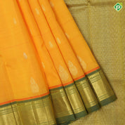 turmeric yellow gold zari fancy flower butta sage green gold zari diamond design one side border silk saree