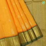 turmeric yellow gold zari fancy flower butta sage green gold zari diamond design one side border silk saree