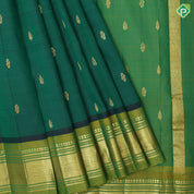 Dark green gold zari fancy butta manthulir green gold zari diamond design one side border silk saree