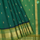 Dark green gold zari fancy butta manthulir green gold zari diamond design one side border silk saree