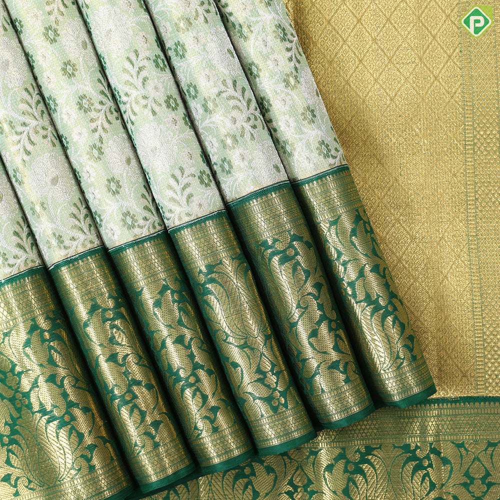 green base with silver and gold zari grand hand woven gold zari lotus design border exclusive bridal silk saree