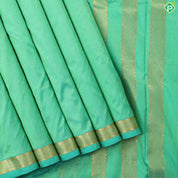 Rexona green plain weaved design self color gold zari edge border madisar 9 yards silk saree
