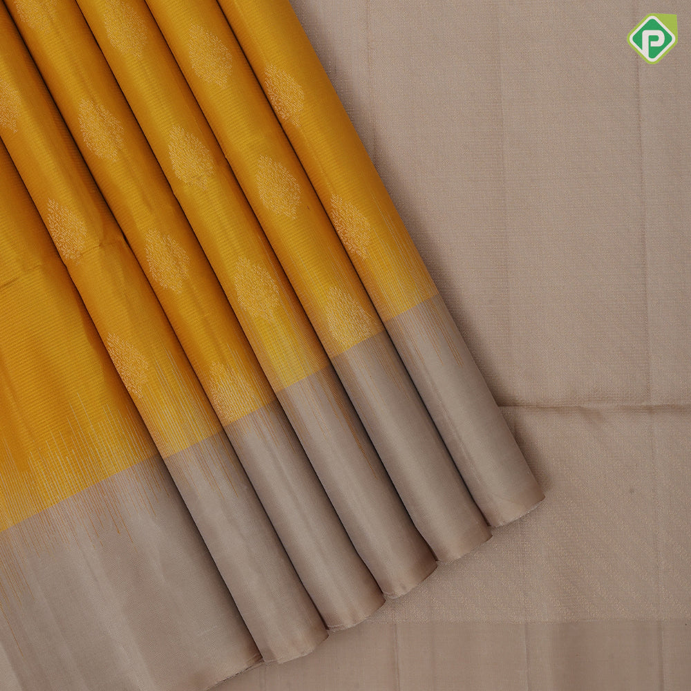 Corn yellow gold zari fancy leaf butta motifs light beige plain border contrast grand pallu soft silk saree