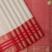 White gold zari geomatical full body design contrast red gold zari peacock annam butta lines border grand bridal silk saree