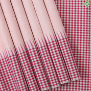 Peach Plain full body weaved design contrast pink with which checked border Traditional silk saree