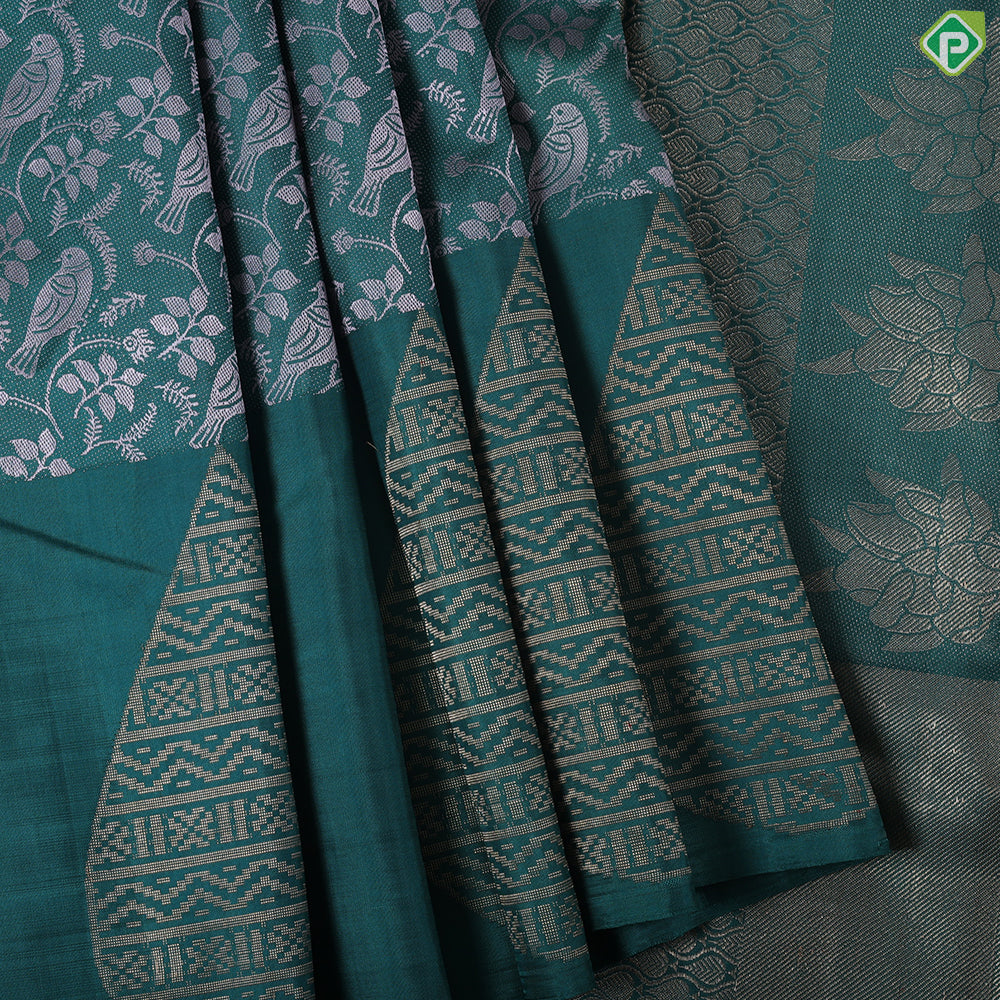 Pine green cream sparrow embossed design self gold zari drop butta border trendy silk saree
