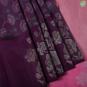 Purple multi color floral embossed design self multi color zari fancy butta border trendy silk saree