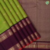 parrot green gold zari  peacock checks design  purple colour vairaoosi peacock and mango border design traditional silk saree