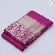 Rani pink gold zari double peacock deer round butta self gold zari flower and diamond border art silk saree
