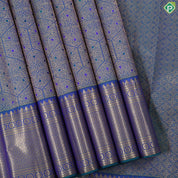 Peacock green gold zari meena work self brocade and gold zari diamond bentex border grand bridal silk saree