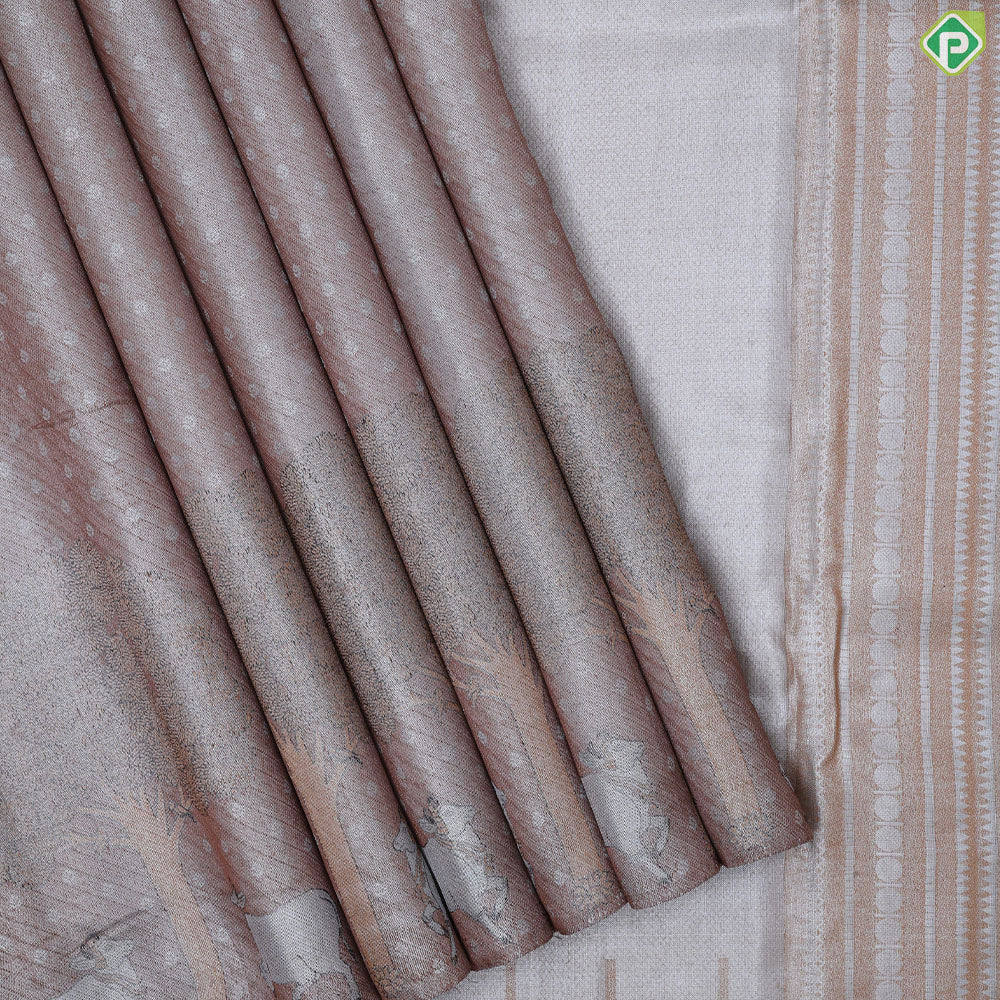 Dark peach silver zari zari by zari butta and shimmer design self cow and tree border master weaved pichwai silk saree