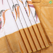 Cream white multicolor flying twitter ikkat design Mustard yellow gold zari multi lines border ikkat silk saree