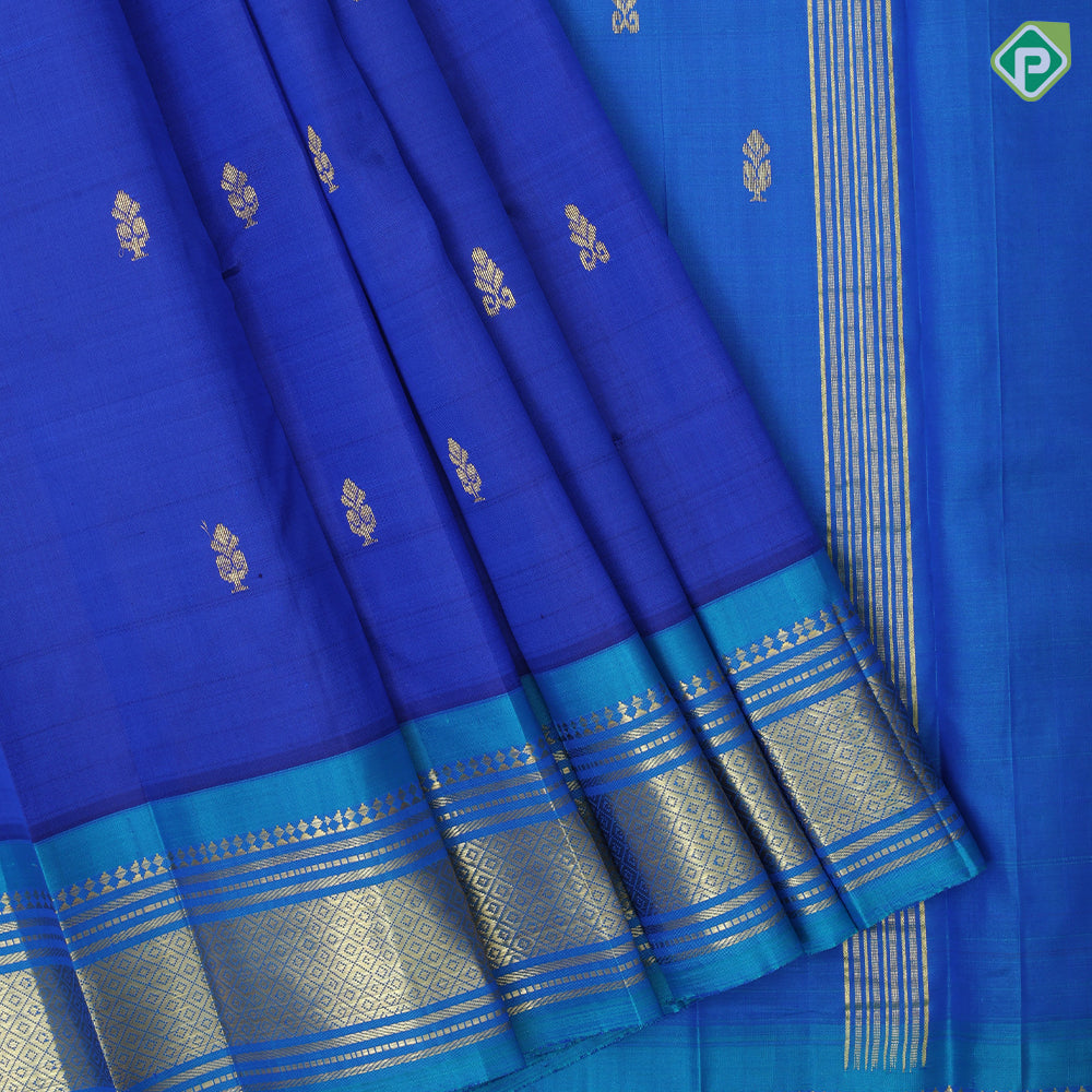 Royal blue gold zari fancy flower butta peacock blue gold zari diamond design one side border silk saree