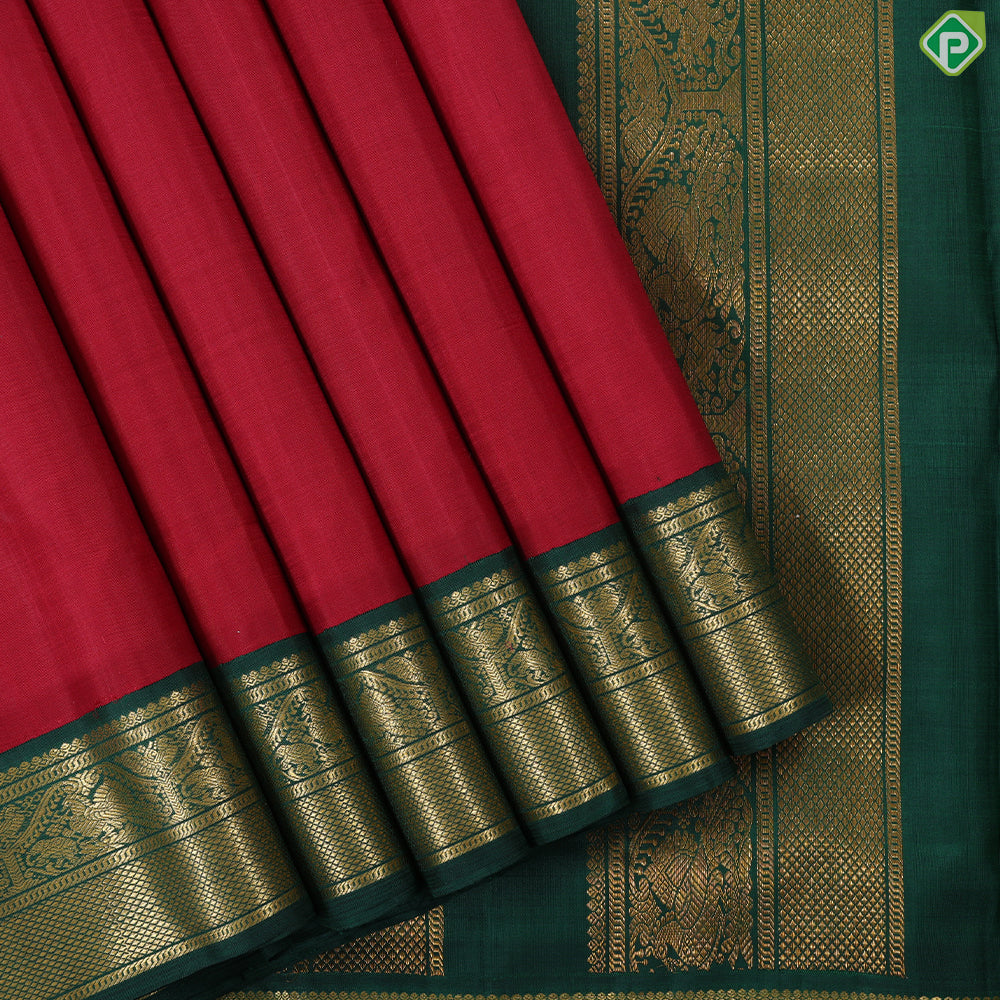 Maroon red plain weaved design bottle green gold zari peacock arch butta border madisar 9 yards silk saree