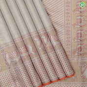 Creamy base gold zari by zari grand brocade design tissue weave self cow and pythonic design pichwai silk saree