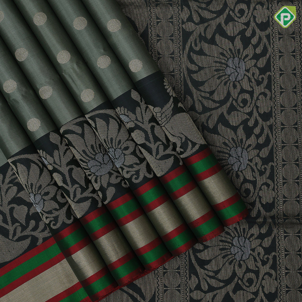Tea green gold zari chakkaram butta motifs olive green rangoli multi color lines mid gold zari border soft silk saree