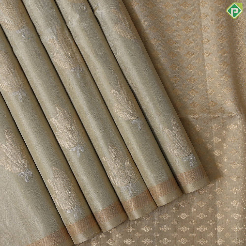 Beige silver gold zari fancy flower design self gold zari edge border soft silk saree