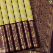 lemon yellow silver zari geometric design contrast purple gold zari border exclusive bridal silk saree