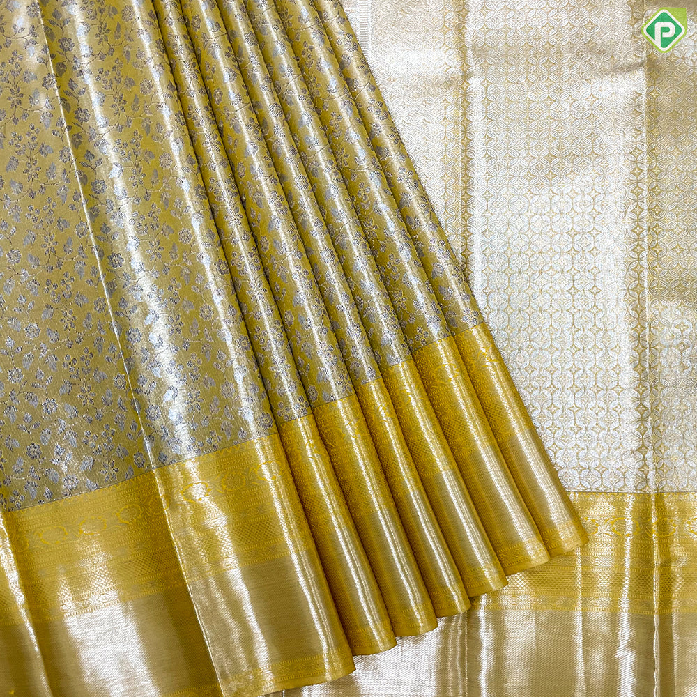 Lemon Yellow Silver And Neem Zari Creeper Design Self Colour Bavanji Rangoli Border Grand Tissue Silk Saree