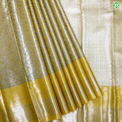 Lemon Yellow Silver And Neem Zari Creeper Design Self Colour Bavanji Rangoli Border Grand Tissue Silk Saree