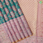 Forest green gold zari floral creeper design baby pink silver gold zari double peacock arch design meena work tissue silk saree