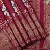 Rani pink gold zari mango and stripes ikkat design self gold zari peacock butta border ikkat silk saree